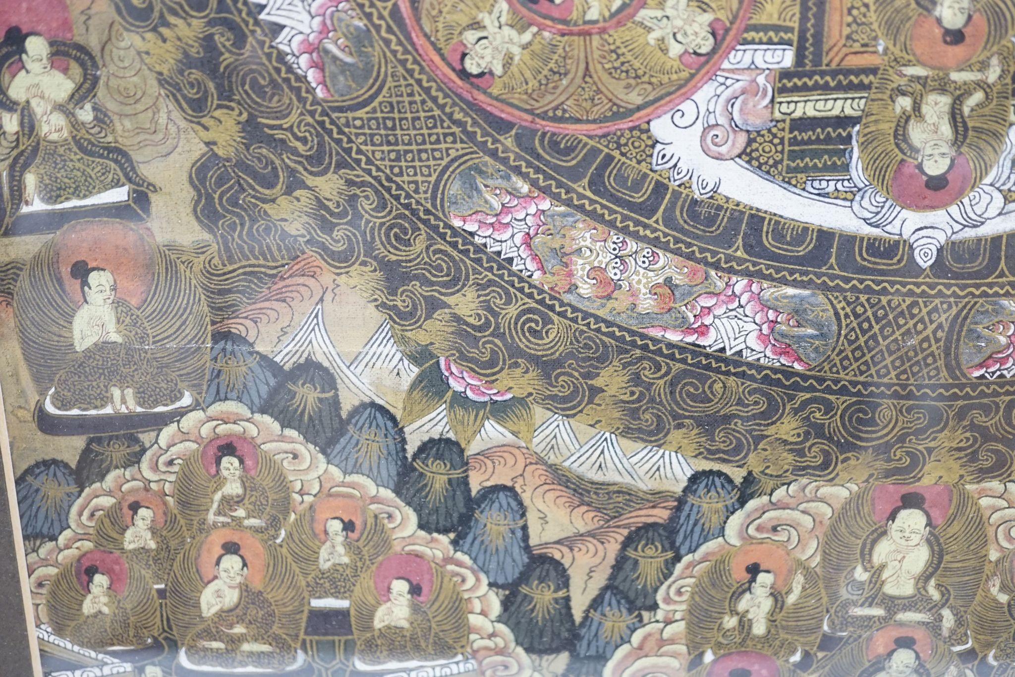 A Nepalese painted mandala thangka., 35 cms wide x 46 cms high.